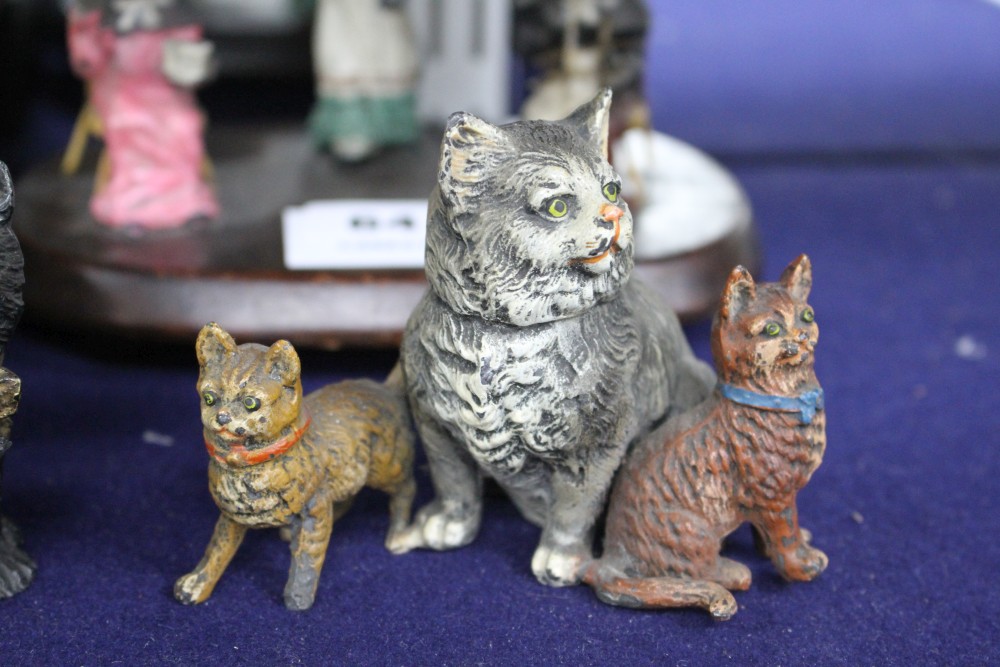 A group of assorted ornaments all relating to cats, comprising: boxed four piece desk set, a painted spelter three cat ornament, two fu